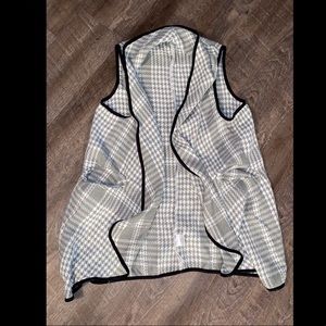 gray and white houndstooth vest